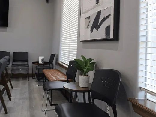 Sunny office waiting room photo.